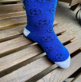 Child's foot fully in the sock