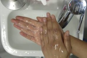 Person rubbing their hands together