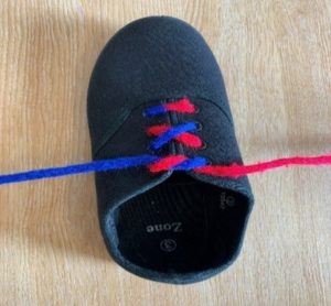 Picture shows both laces pulled tight