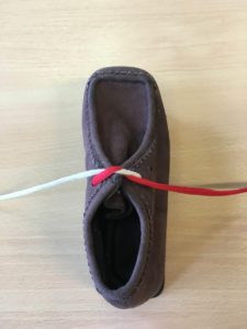 Picture shows both laces pulled tight