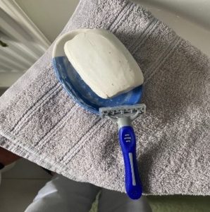 Soap, towel and a razor