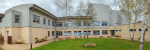 Wide angle photo of the Peace Garden at Stoke Mandeville Hospital with the new furniture