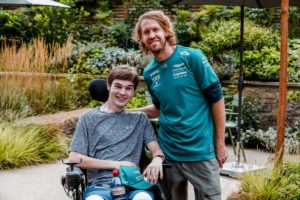 Sebastian Vettel in Horatio's Garden with NSIC patient, Michael